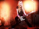 Is Avril Lavigne a Rockstar? Unraveling the Iconic Pop-Punk Queen